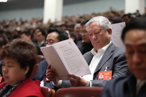 3月12日，十二屆全國人大五次會議在北京人民大會堂舉行第三次全體會議。這是全國政協(xié)委員列席會議。新華社記者 金立旺攝。