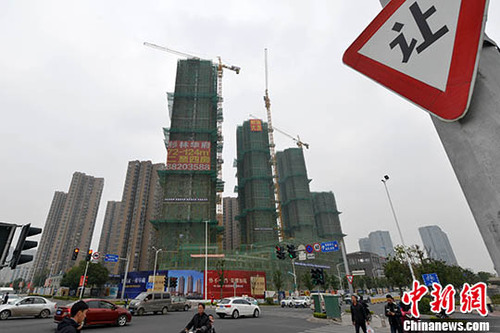 資料圖：福州一處商品房在建中。 <a target='_blank' href='http://www.chinanews.com/'>中新社</a>記者 呂明 攝