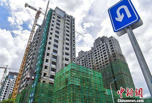 資料圖：正在建設的樓房。 <a target='_blank' href='http://www.chinanews.com/'>中新社</a>記者 駱云飛 攝